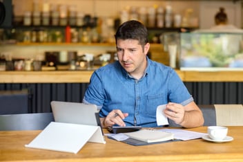 Manager going over invoices