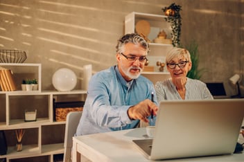 couple looking at laptop