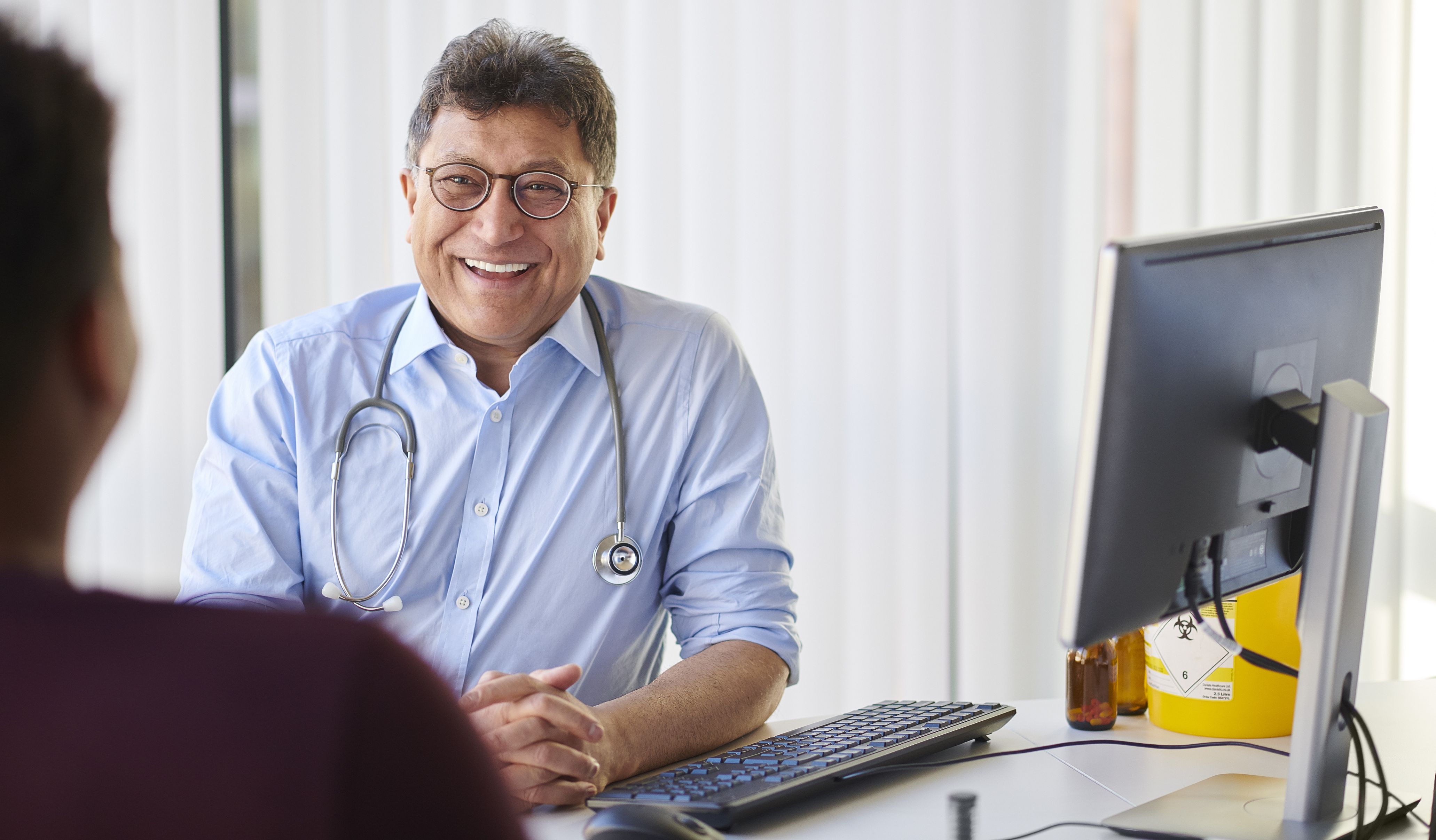 doctor_smiling_at_patient