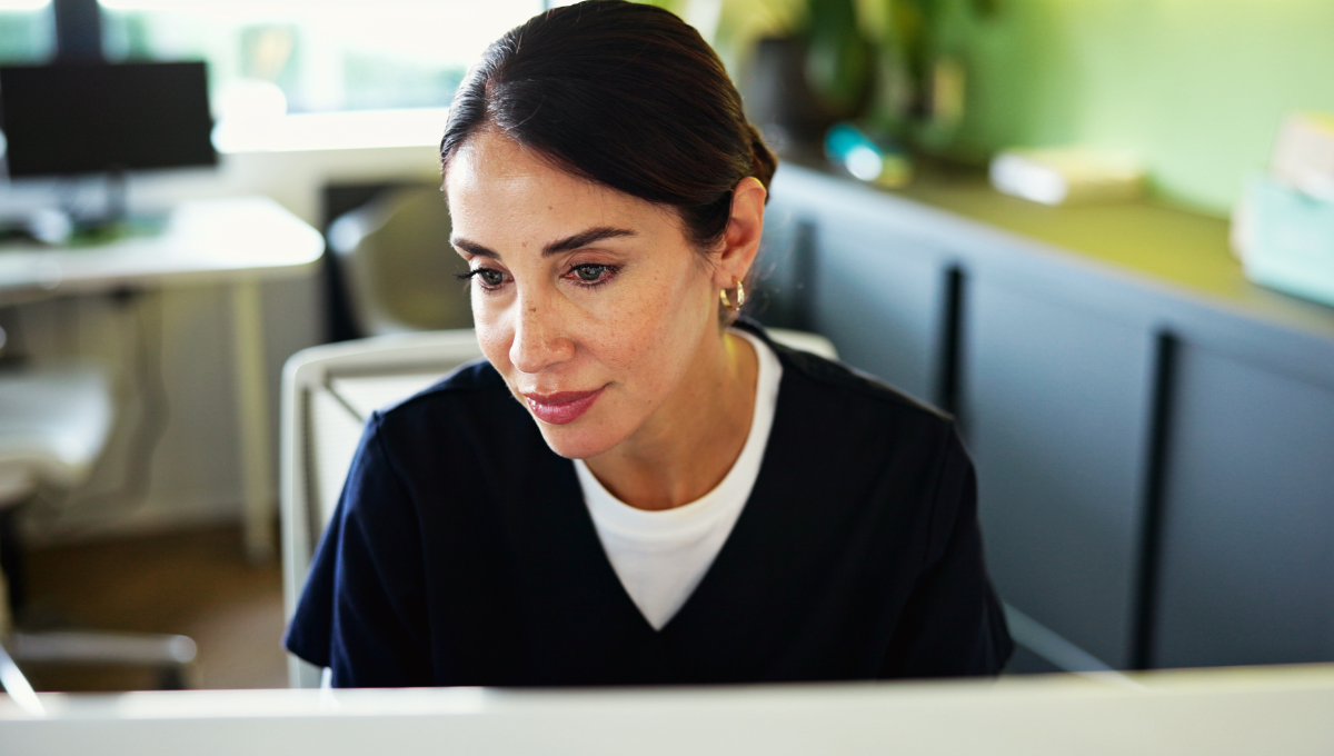 Healthcare professional completing administration work